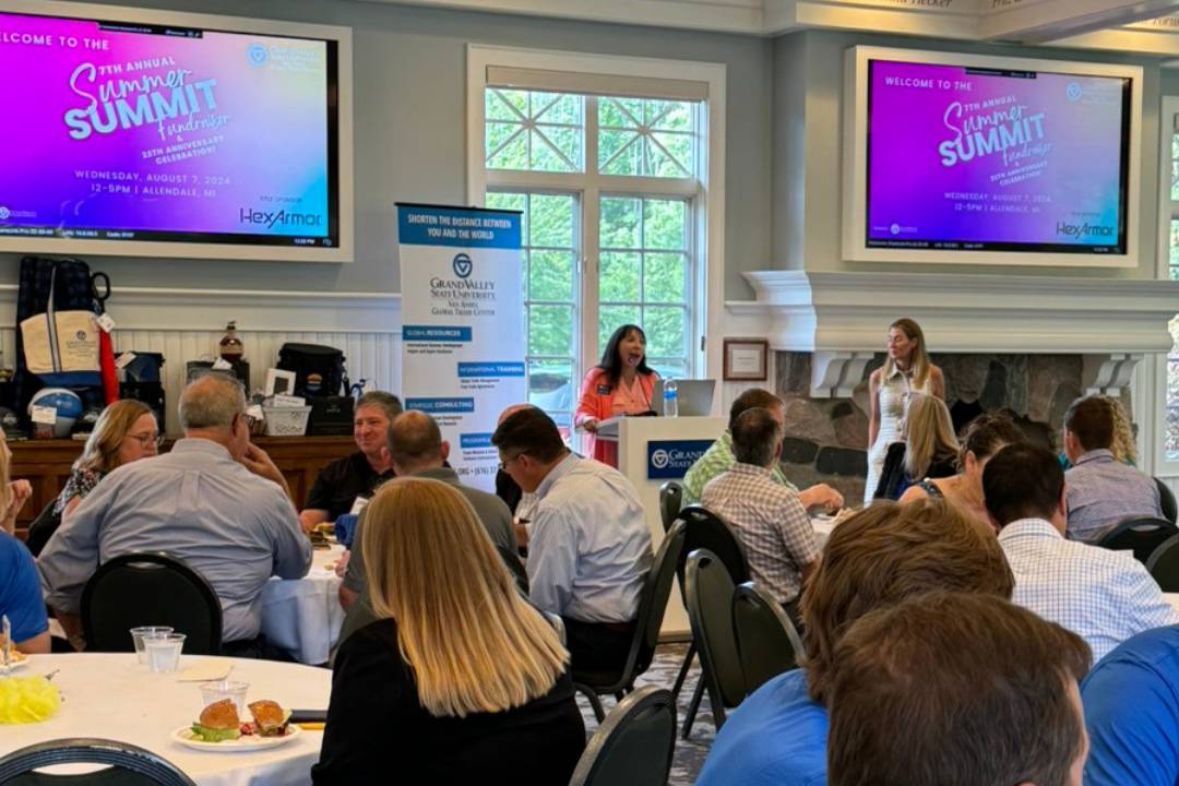 Room of people at summer summit